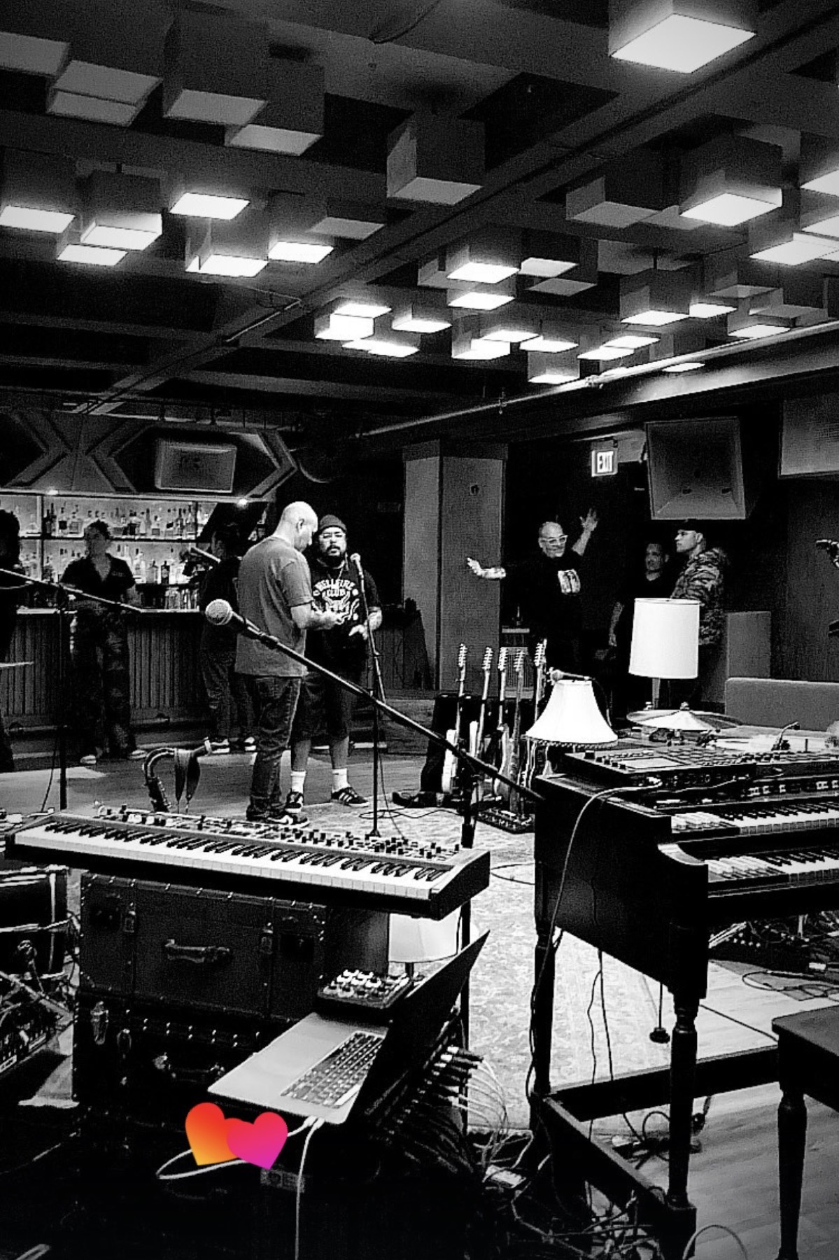 Black and white photo of a rehearsal room setup